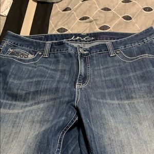 Blue jeans with rhinestone embellishments